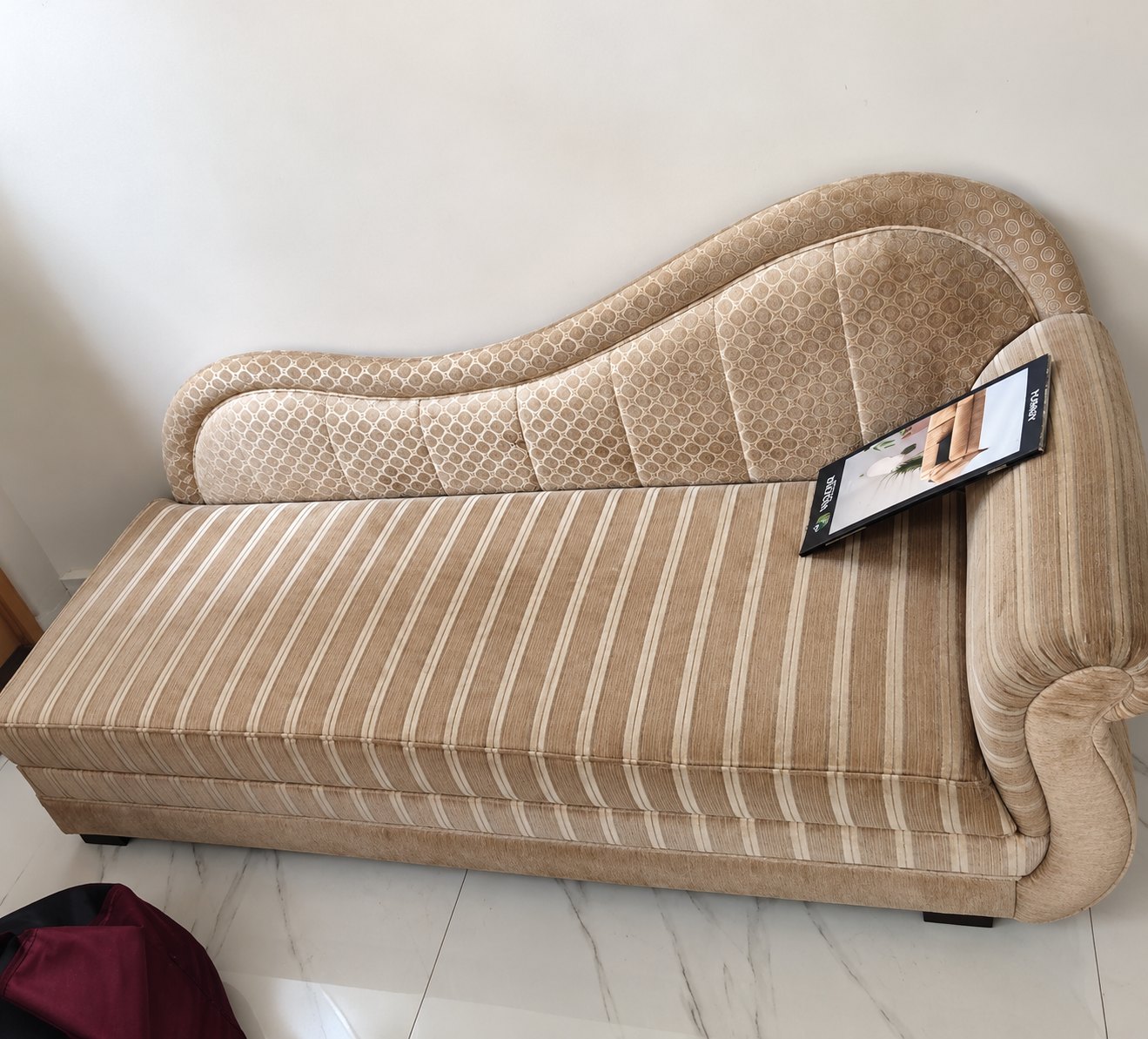 Chaise lounge before repair, worn and torn